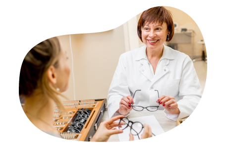Optician testing glasses with a patient. Optician testing glasses with a patient.