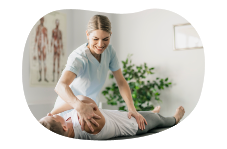 Physical therapist helping treat a patient.
