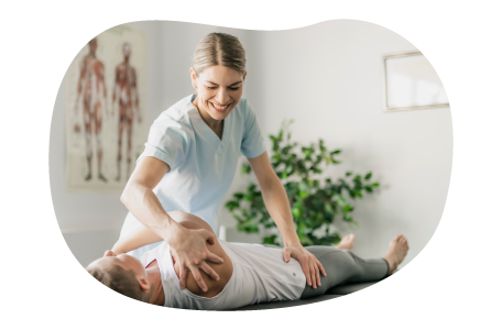 Physical therapist helping treat a patient.