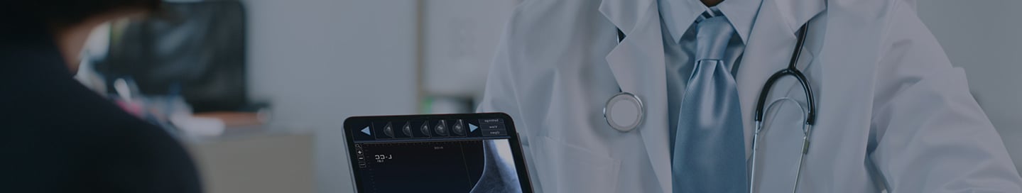 A physician assistant is consulting with a patient on their health goals A physician assistant is consulting with a patient on their health goals