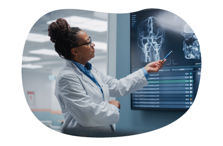 Radiologist reviewing x-rays. Radiologist reviewing x-rays.