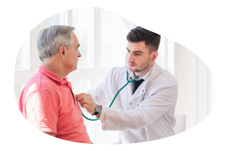 A respiratory therapist listens to a patient's breathing. A respiratory therapist listens to a patient's breathing.