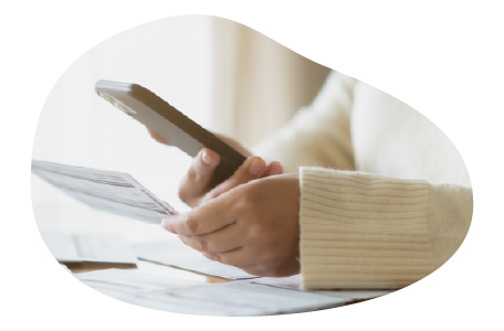 Home-based service business owner calculating insurance costs.