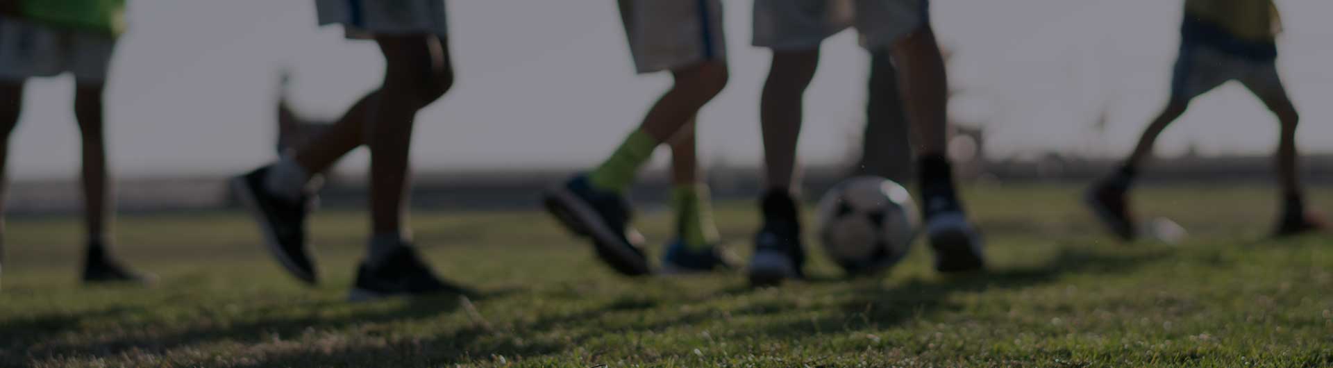 Kids on a soccer field after school. Kids on a soccer field after school.