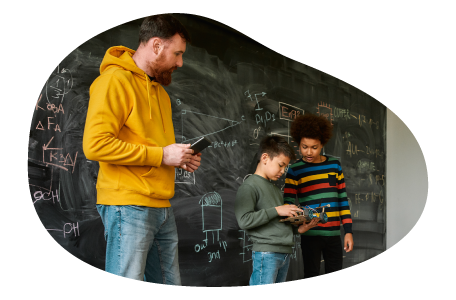 After-school youth program leader speaking with kids.