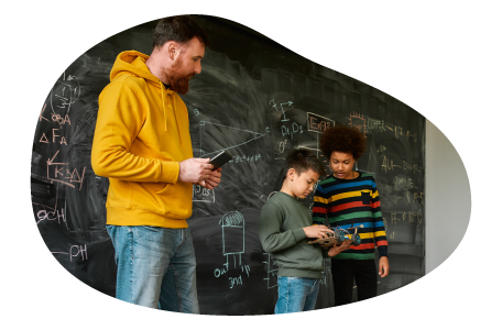 After-school youth program leader speaking with kids. After-school youth program leader speaking with kids.