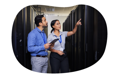 Tech experts evaluate data center equipment.