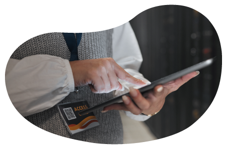 IT business owner makes calculations on a tablet.