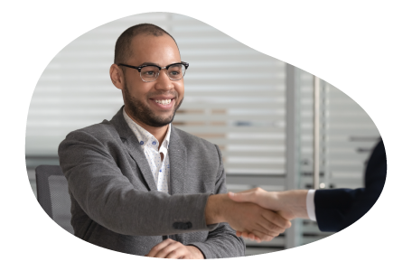 IT staffing agency employee shaking hands with a client. IT staffing agency employee shaking hands with a client.