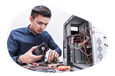 An employee at a PC building business assembles a computer.