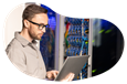 A penetration tester working in a client's server room.