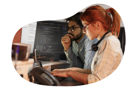 Software developers reviewing coding for a project. Software developers reviewing coding for a project.