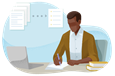Technical writer writing on paper in front of a laptop.