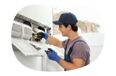 Appliance installation professional connecting appliance wiring. Appliance installation professional connecting appliance wiring.