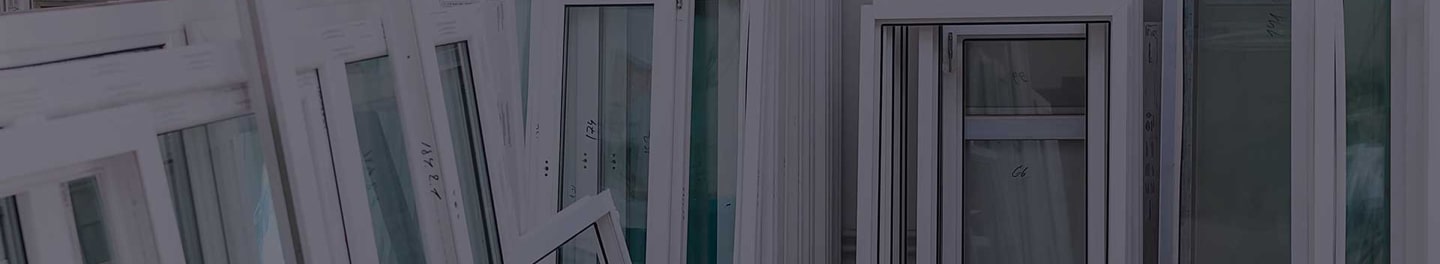 Stack of windows ready for installation.