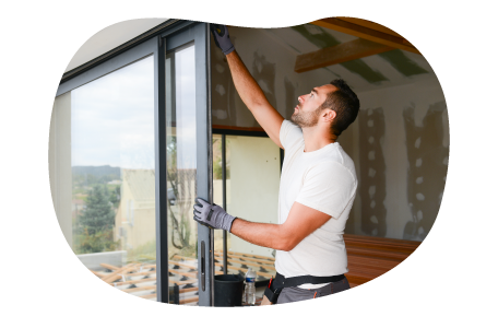 Contactor installing a sliding door in a home.