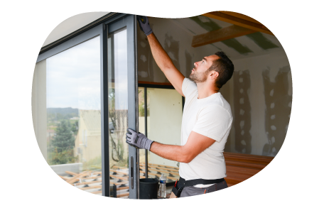 Contactor installing a sliding door in a home. Contactor installing a sliding door in a home.