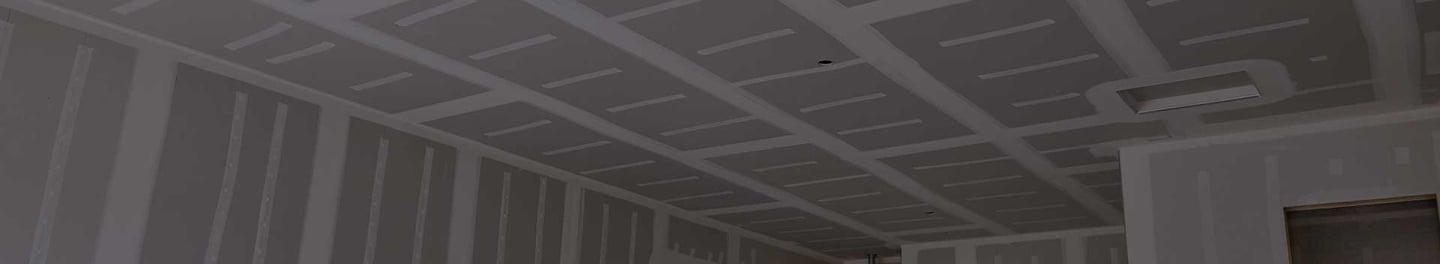 Open room with completed drywall. Open room with completed drywall.