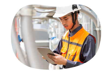 A contractor inspects a fire sprinkler system.