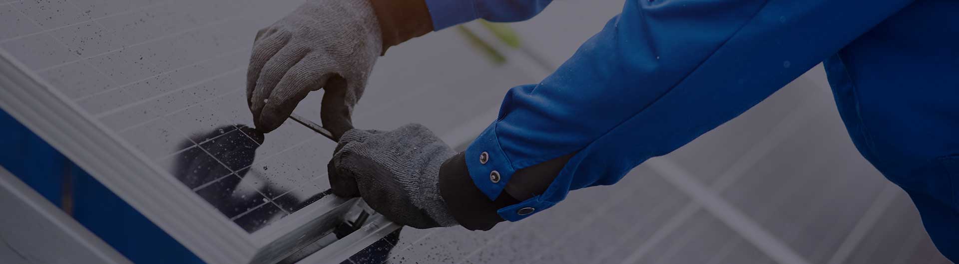 Person installing solar panels.