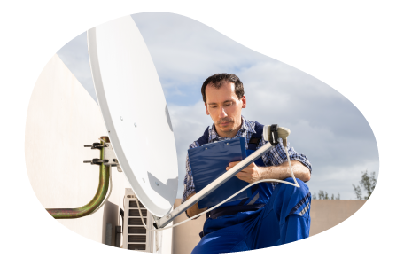 A contractor installs a new satellite dish.