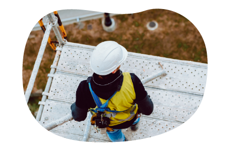 A scaffolding contractor working on a platform.