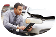 Insurance claims adjuster evaluating vehicle damage.