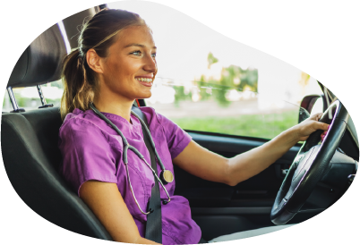 A healthcare professional driving a non-emergency medical transportation vehicle. A healthcare professional driving a non-emergency medical transportation vehicle.
