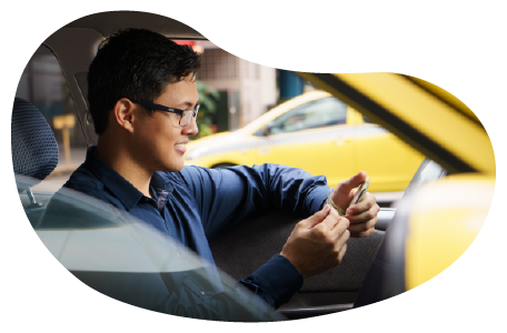 A taxi driver messaging a client.