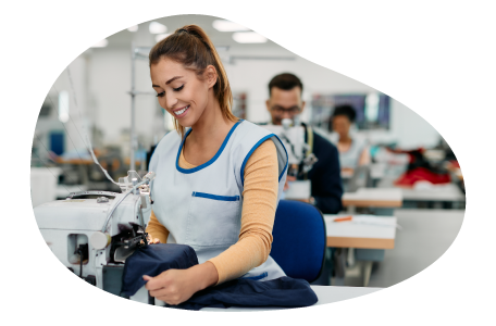 Apparel manufacturer stitching together a piece of clothing.