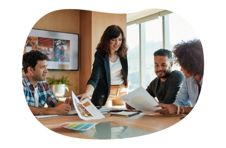 Advertising agency team reviewing a marketing plan. Advertising agency team reviewing a marketing plan.