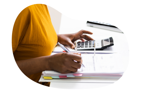 Media and advertising professional calculating the cost of business insurance.