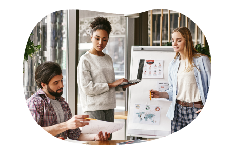 Social media company employees planning a social calendar. Social media company employees planning a social calendar.