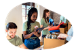 Charity center workers collecting food donations.