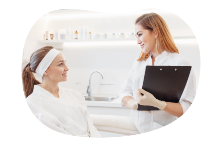 A hair removal specialist meets with a client.