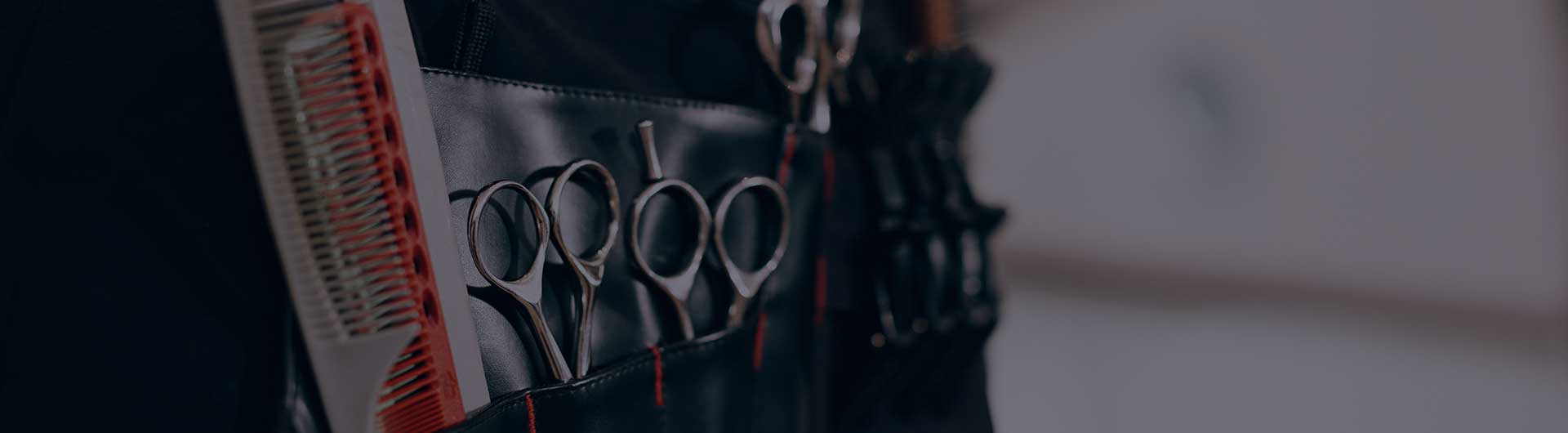 Hairstylist tools in an apron. Hairstylist tools in an apron.