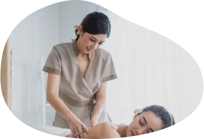 Massage therapist treating a client. Massage therapist treating a client.