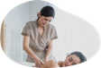 Massage therapist treating a client.