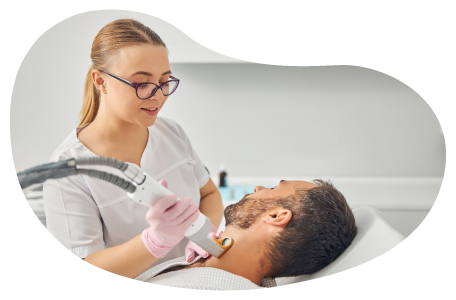 Medical spa employee treating a client.