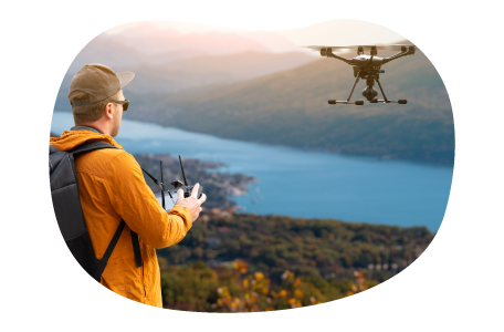 Aerial drone photographer taking a picture of a landscape.
