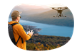 Aerial drone photographer taking a picture of a landscape.