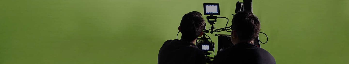 Photography studio set up with a green screen.