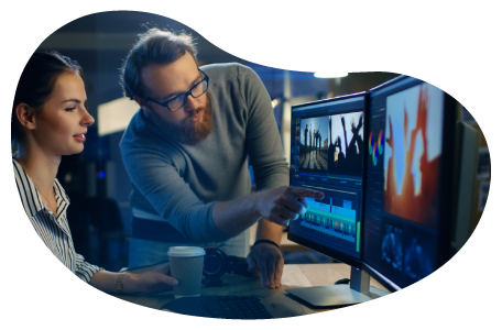 Video production crew reviewing a scene in an editing studio.