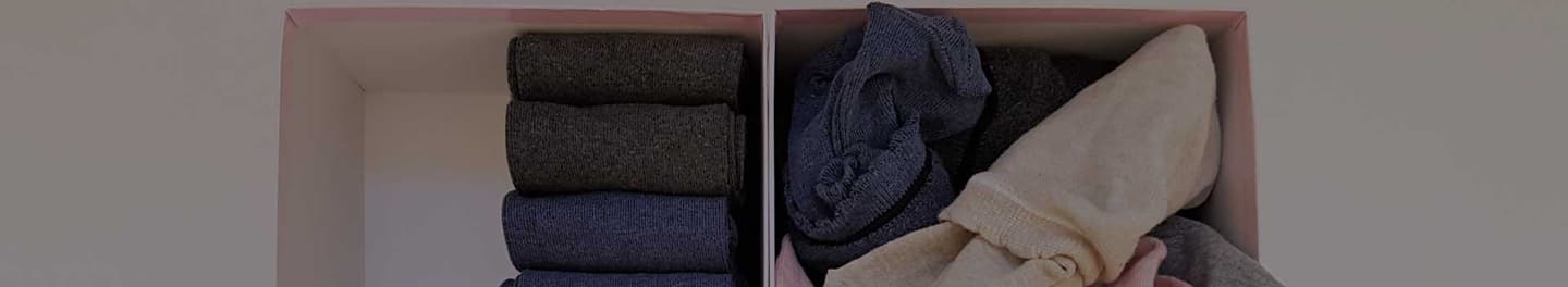 Boxes containing folded clothes.