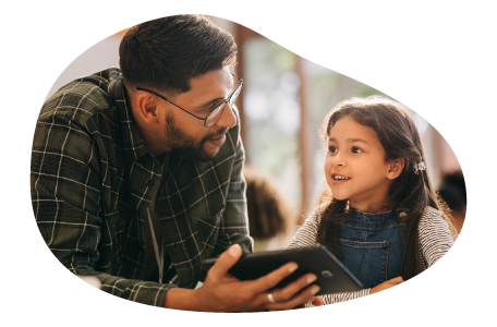 Tutor helping teach a child.