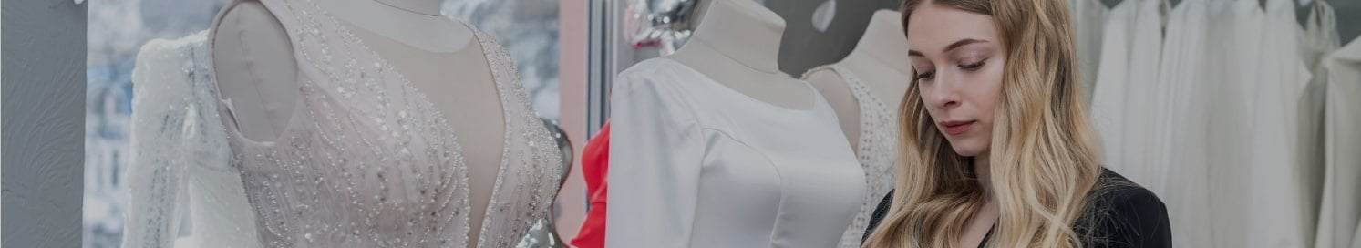 A wedding planner researching wedding dresses. A wedding planner researching wedding dresses.
