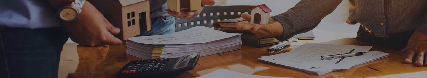 Mortgage broker at a desk Mortgage broker at a desk