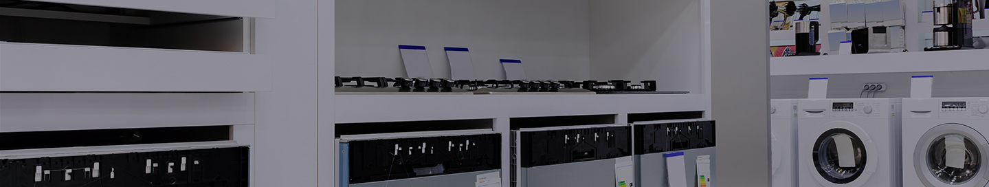 Washing machines and other units on display at an appliance store.