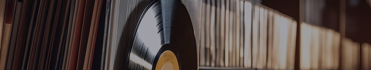 A record on display in a store that sells books and records.