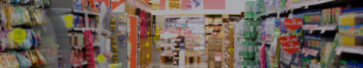 Aisles stocked with a wide range of products at a general store.